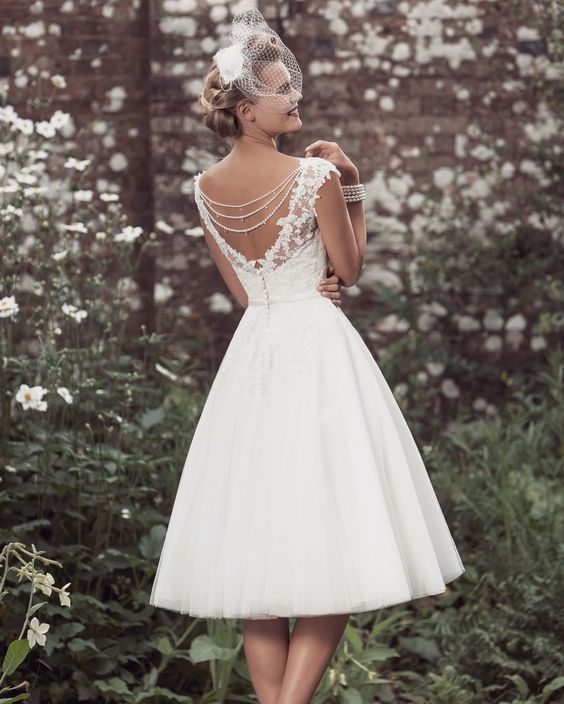 white calf length dress